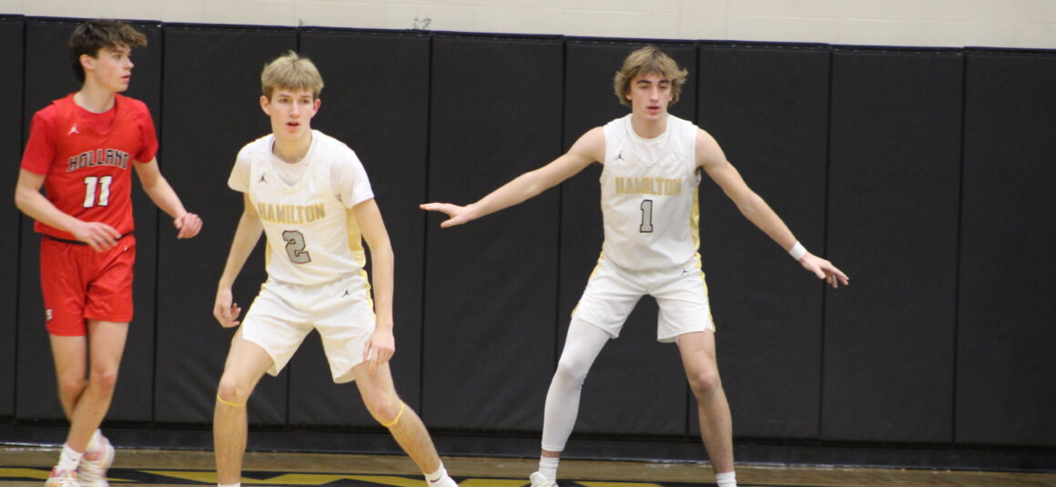 Boys Basketball loses battle to Byron Center
