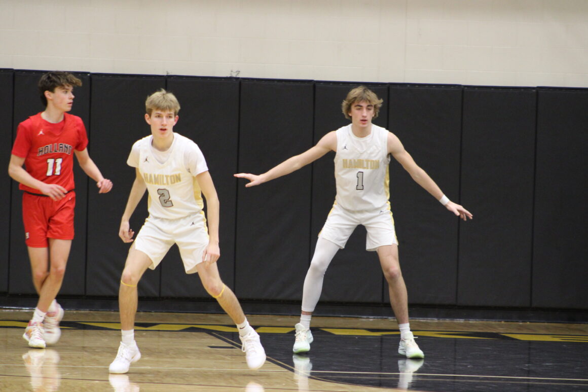 Boys Basketball loses battle to Byron Center