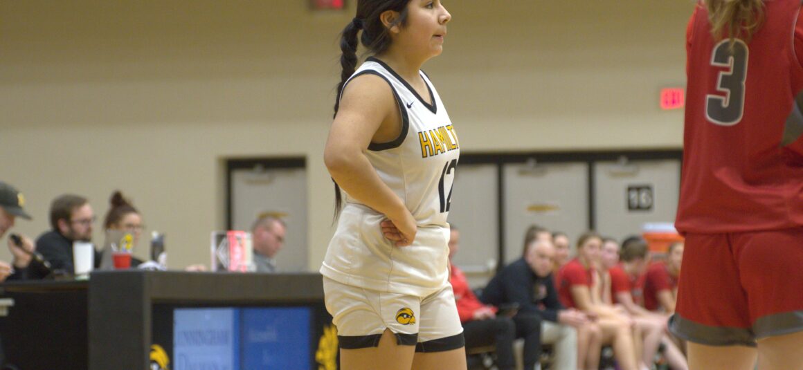 Hawkeyes get handled by West Catholic 57-36