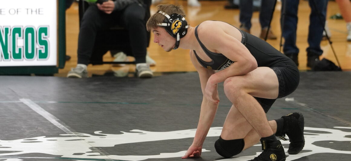 The dual struggles of Hamilton wrestlers on and off the mat
